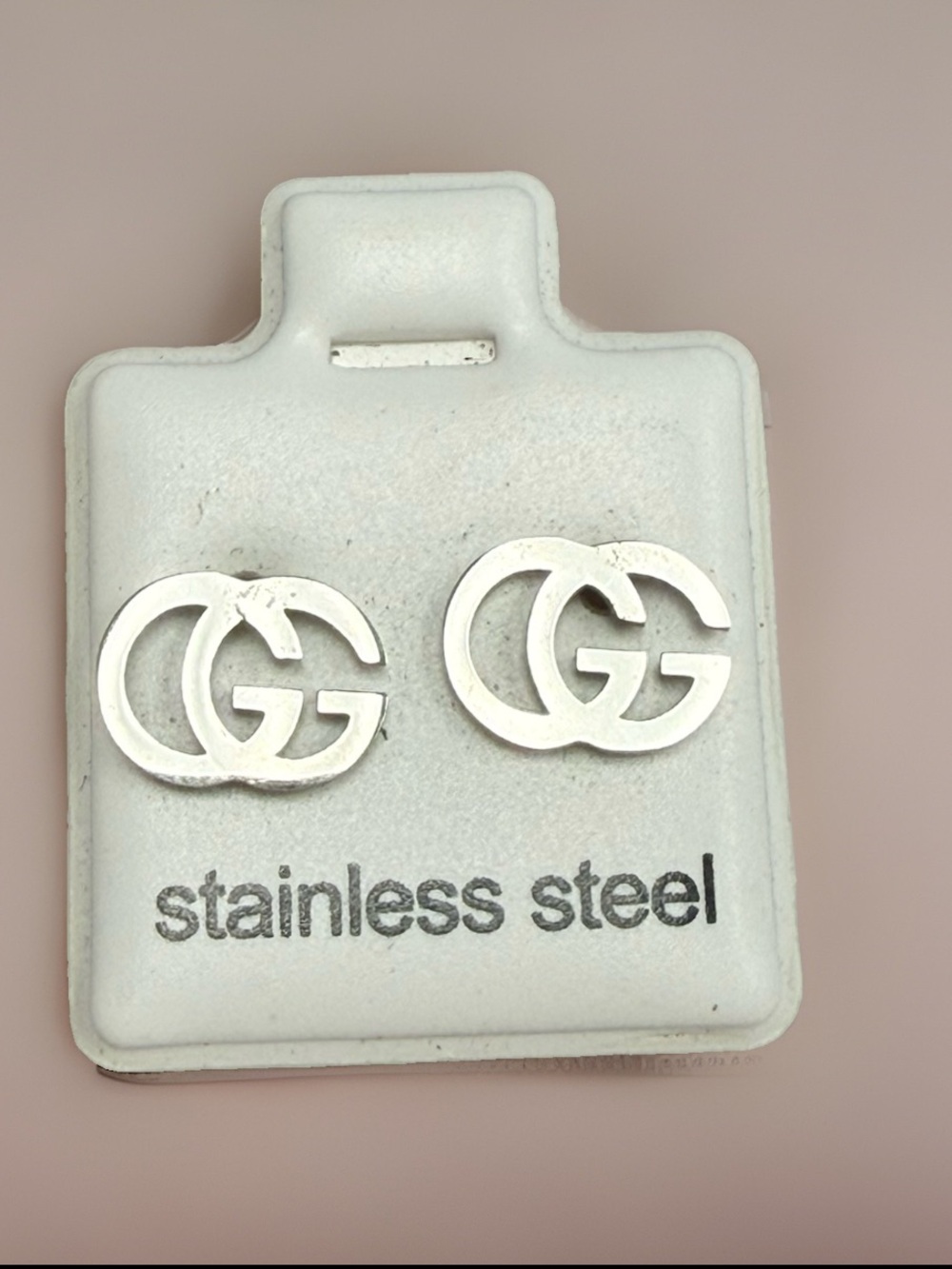 Stainless steel CG stud silver studs designer inspired